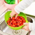 Thick drain basket rice bowl with handle, kitchen essential.