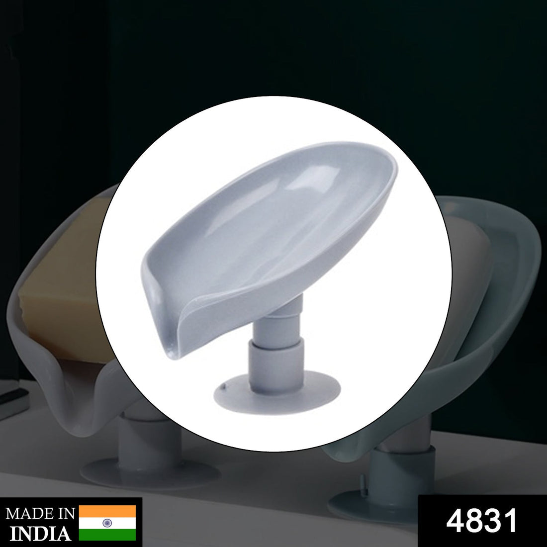 Self-draining soap holder in leaf shape for bathroom or kitchen.