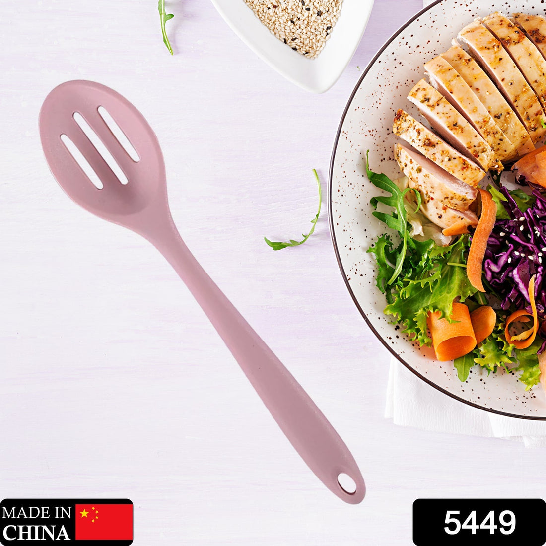 Heat-resistant silicone cooking utensil, 27cm, designed for kitchen use.