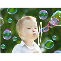 Bubble gun liquid refill bottle with a clear label showing liquid inside