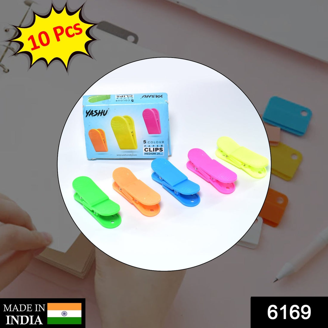 a 28mm paper clip for holding clothes or papers over wires