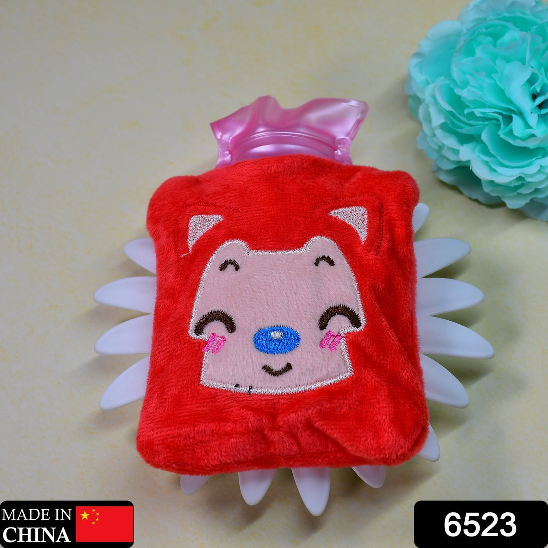 Pink cat-shaped hot water bag with cover for pain relief