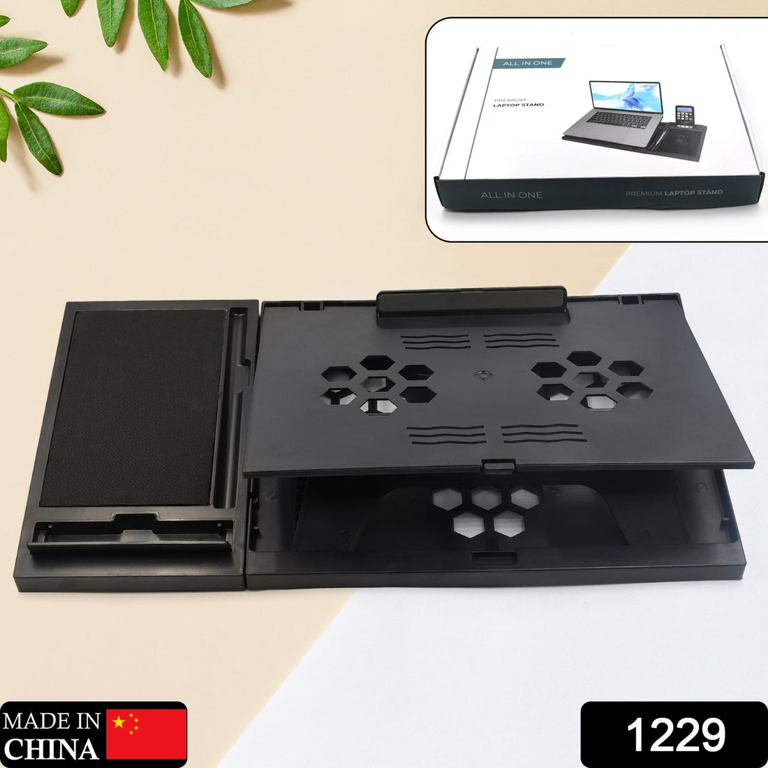 Portable foldable laptop stand with phone holder, compatible with MacBook and tablets.