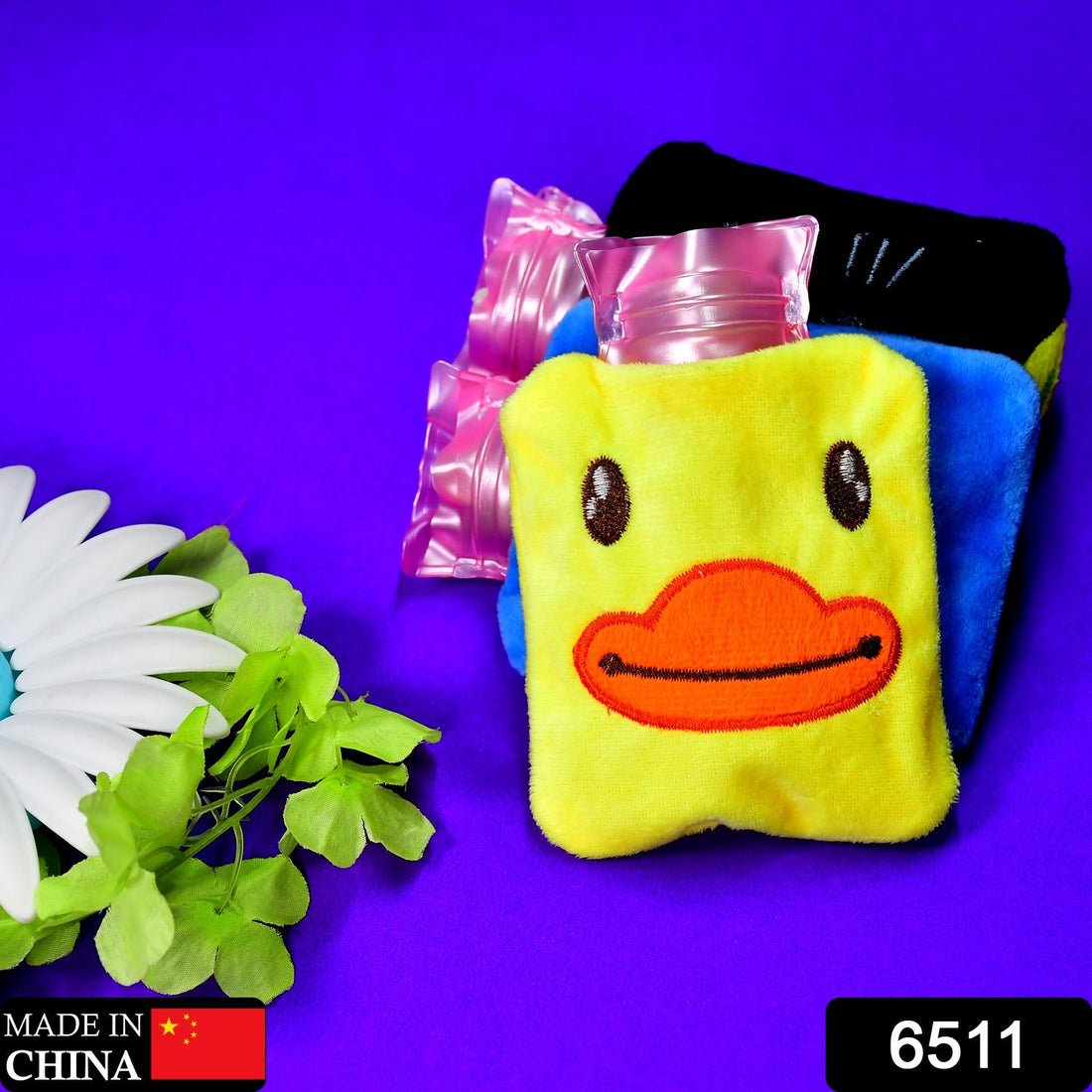 Yellow duck hot water bag with cover for pain relief and warming