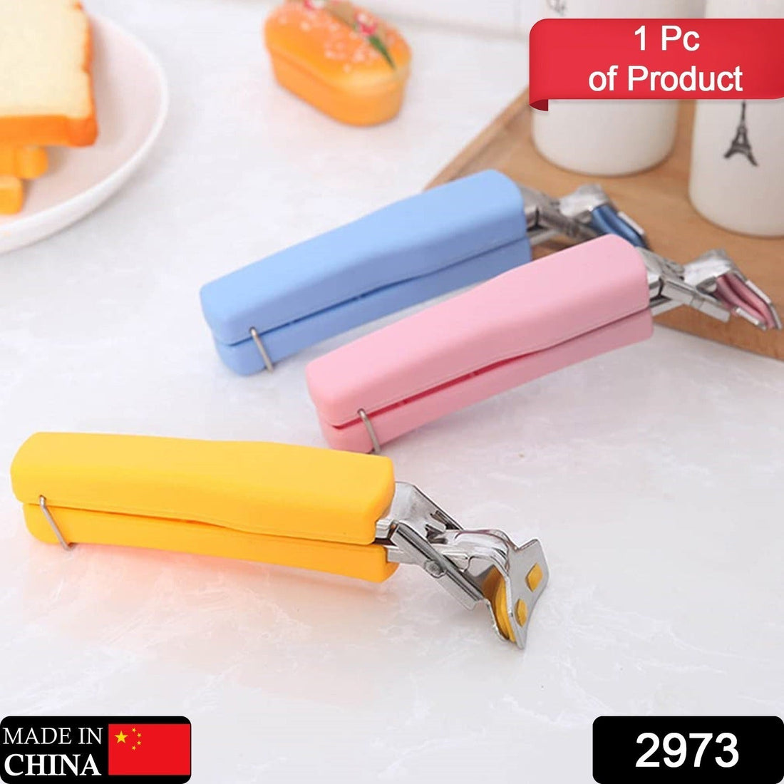 Stainless steel dish tongs, ideal for handling hot plates and bowls in the kitchen.