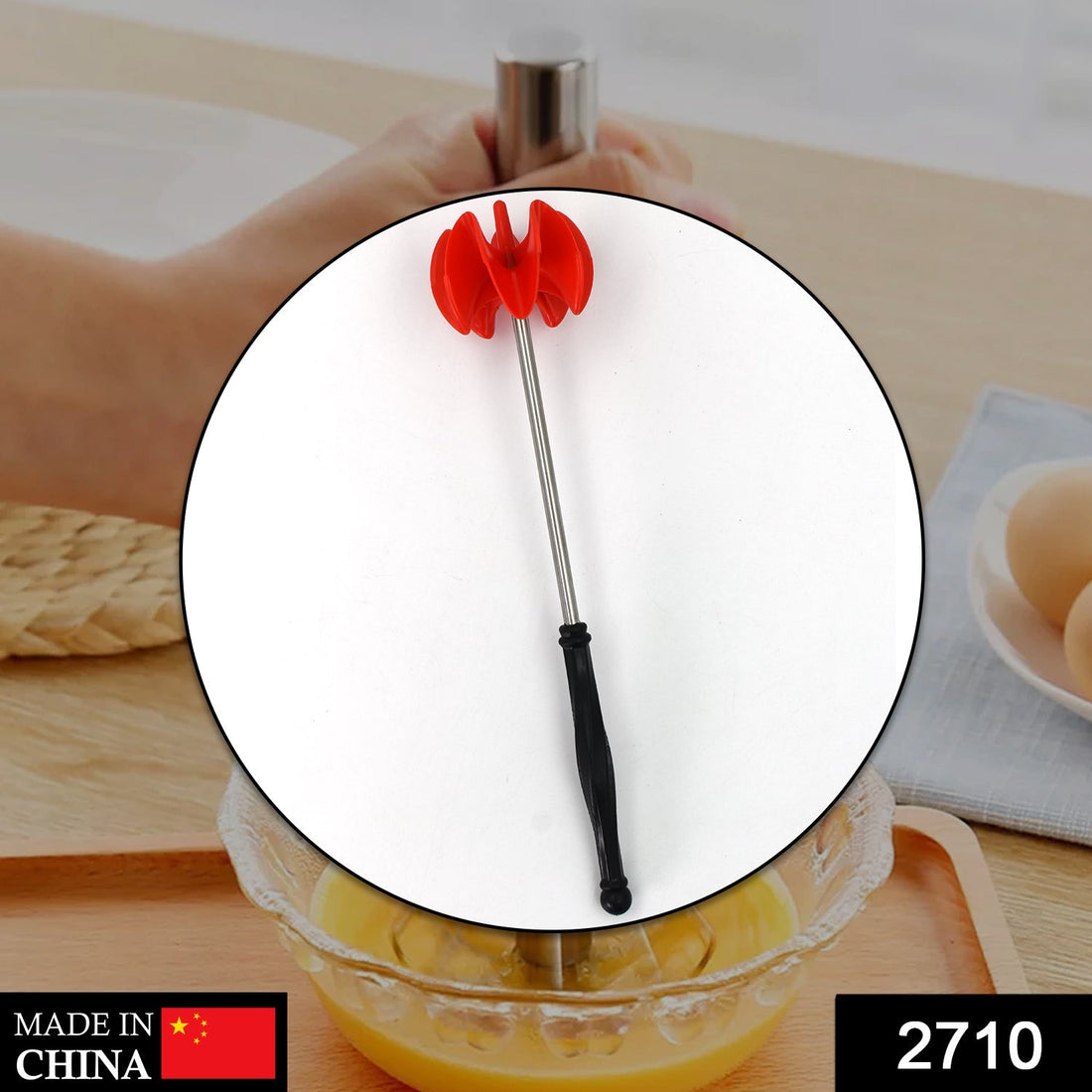 Manual hand mixer for easy food mixing at home.