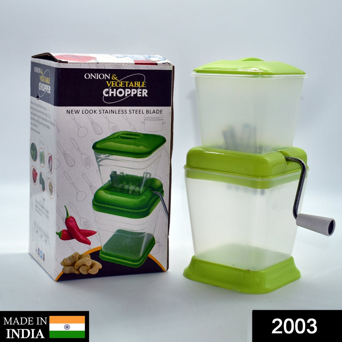 Small onion and vegetable chopper with rotating blade for fast cutting.