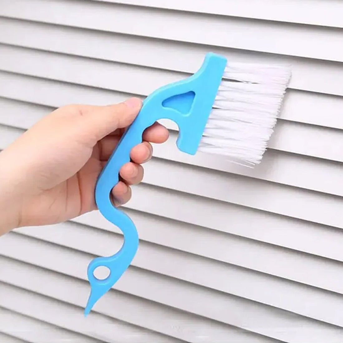 Mini cleaning brush for gaps, ideal for corners and sliding doors.