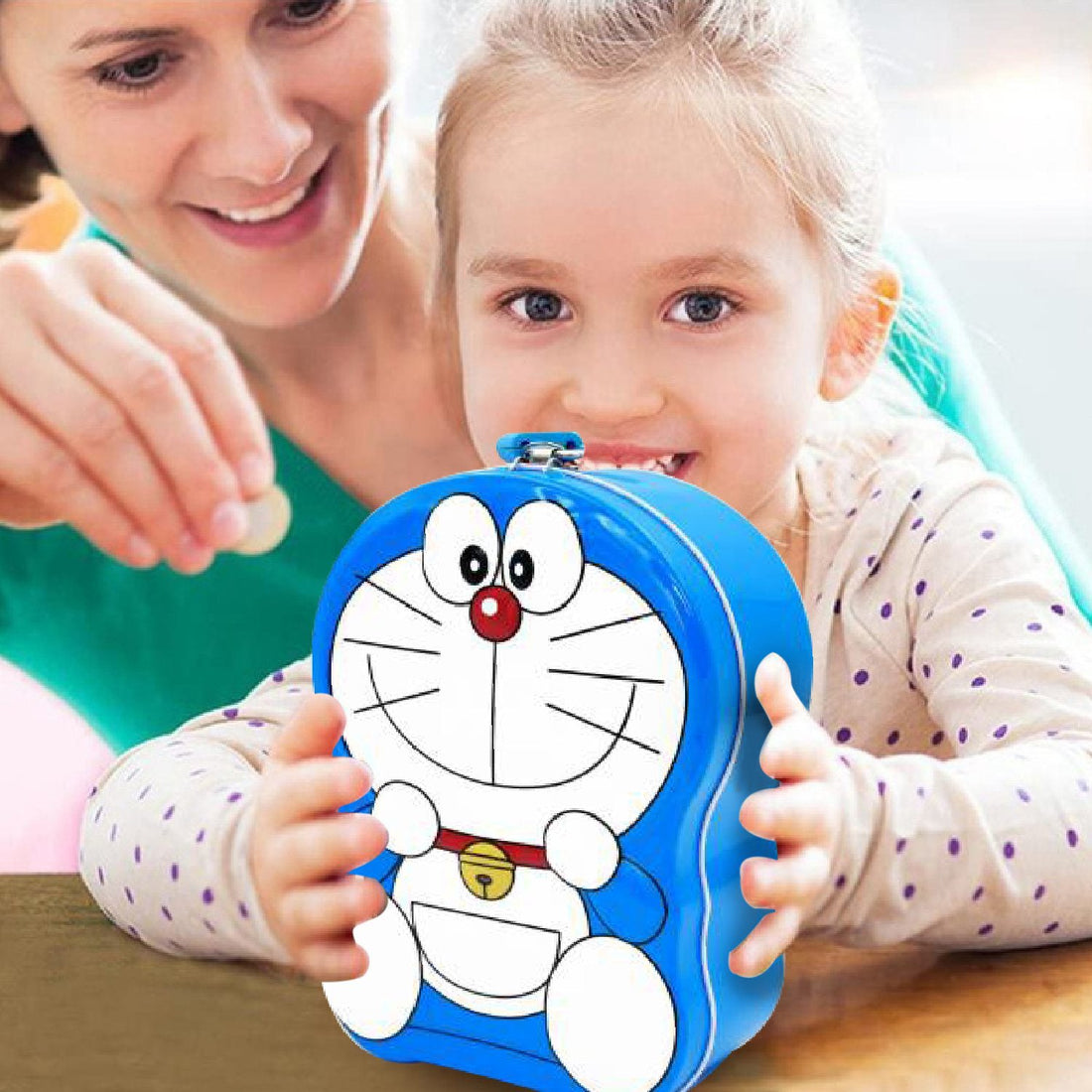 Metal piggy bank featuring cartoon characters, designed as a coin and money box for saving