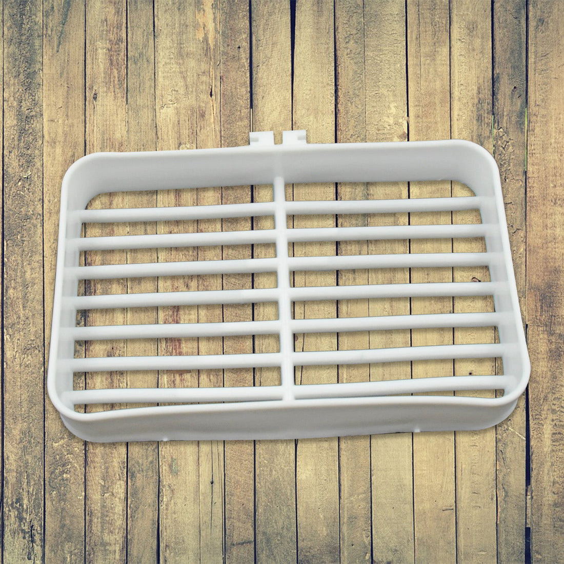 Self-adhesive plastic soap holder for bathroom and kitchen