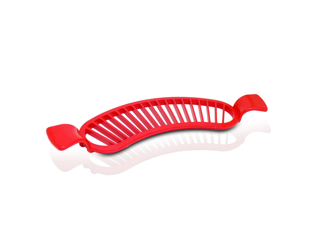 Plastic banana slicer with handle for easy slicing.