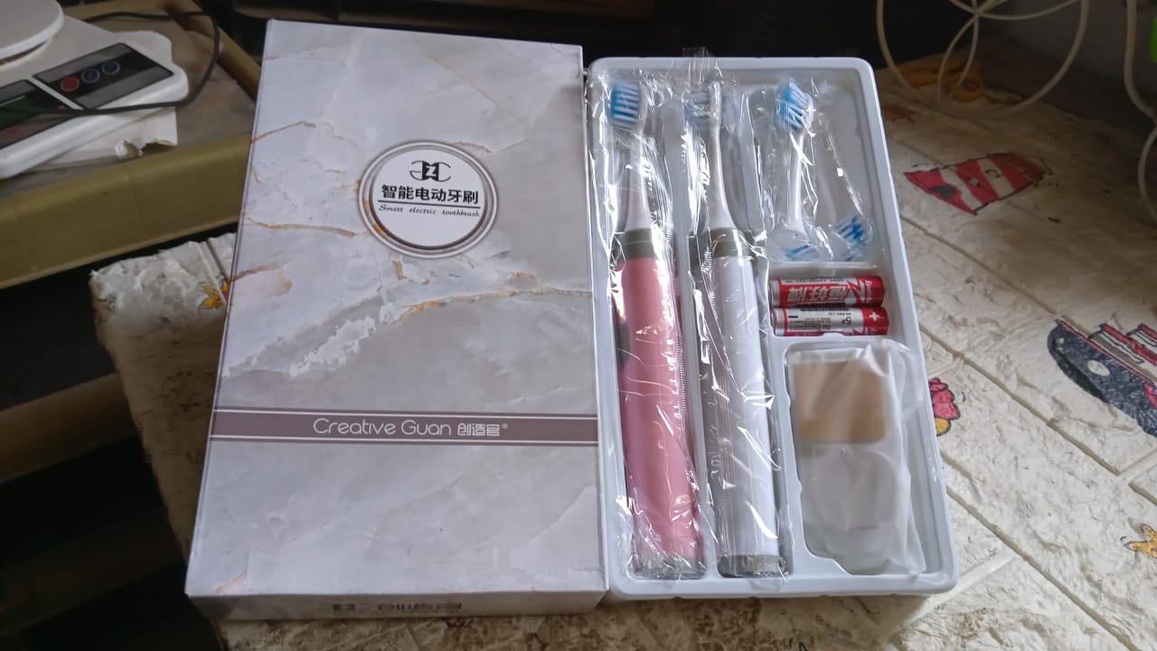 Adult Waterproof Electric Toothbrush Strong Sonic Charging with 4 Toothbrush Head and a toothbrush holder your brand